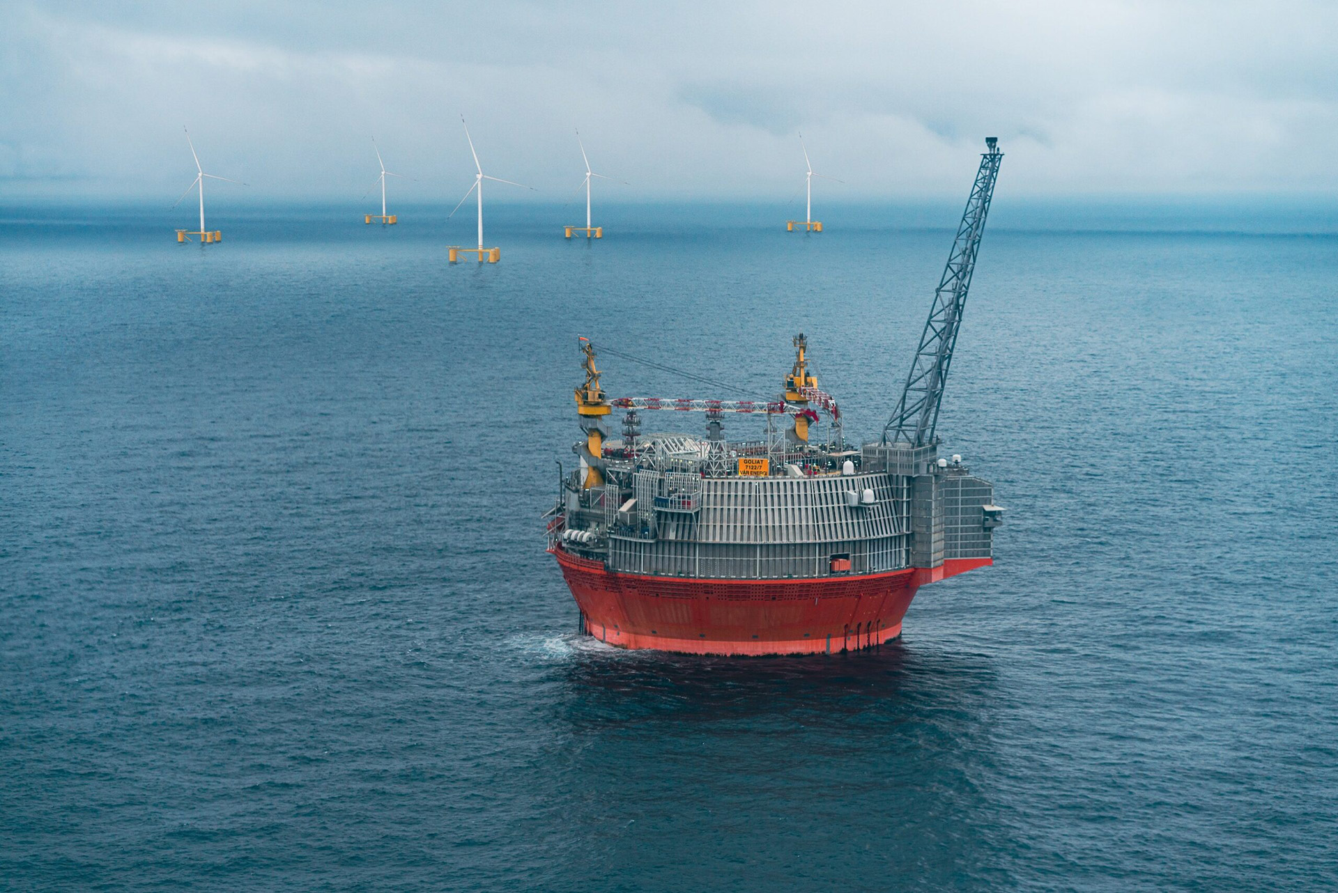 Offshore wind farm projects in the Barents Sea. Goliat FPSO in front.